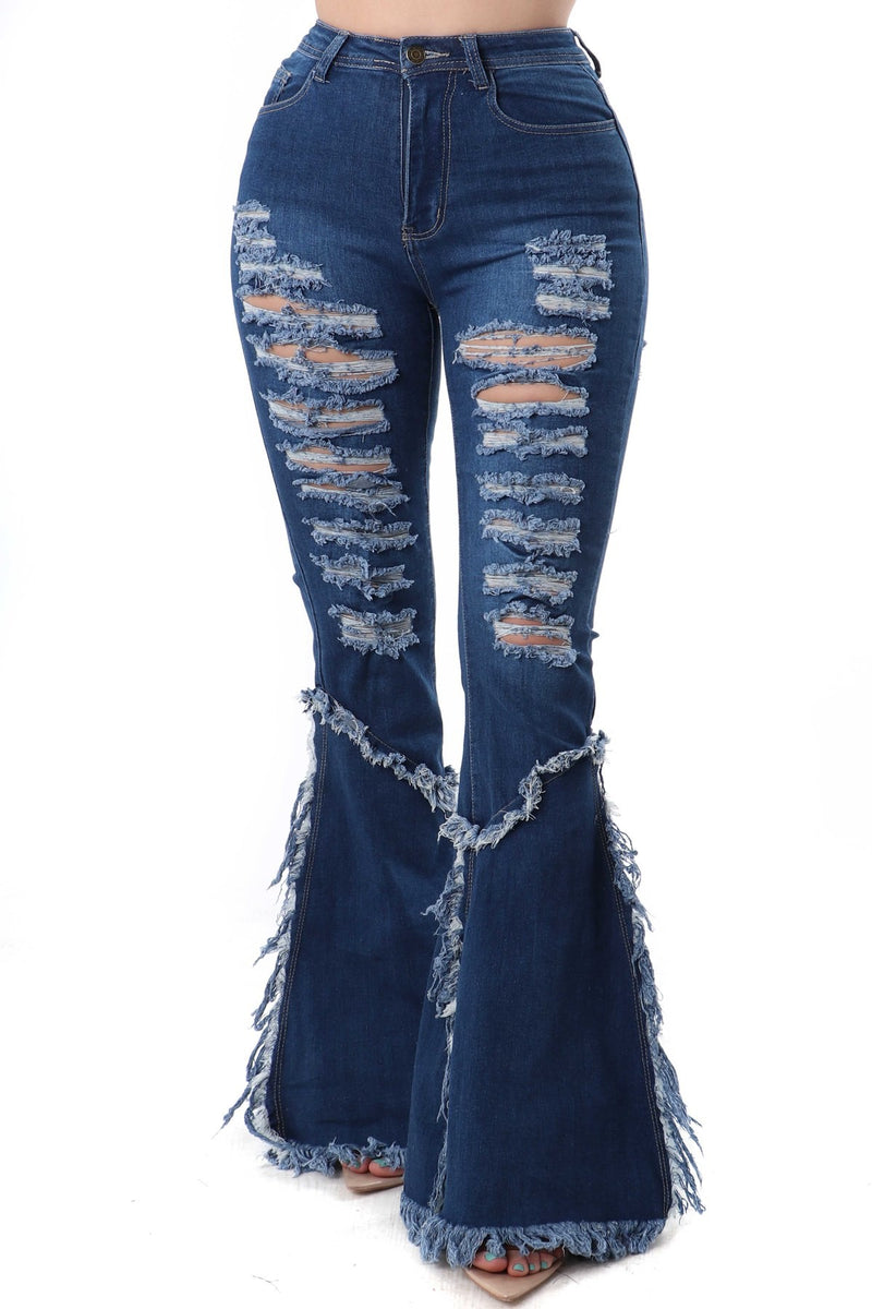 Jeans desgastados de pierna ancha y cintura alta