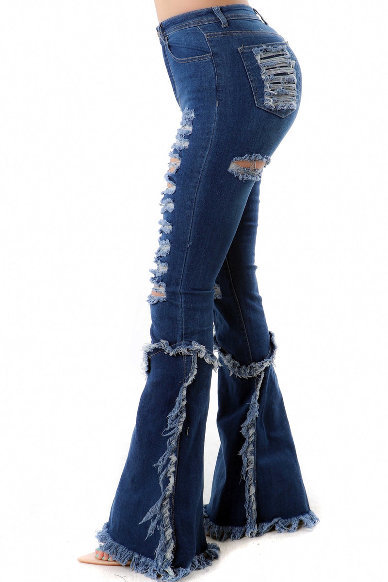 Jeans desgastados de pierna ancha y cintura alta