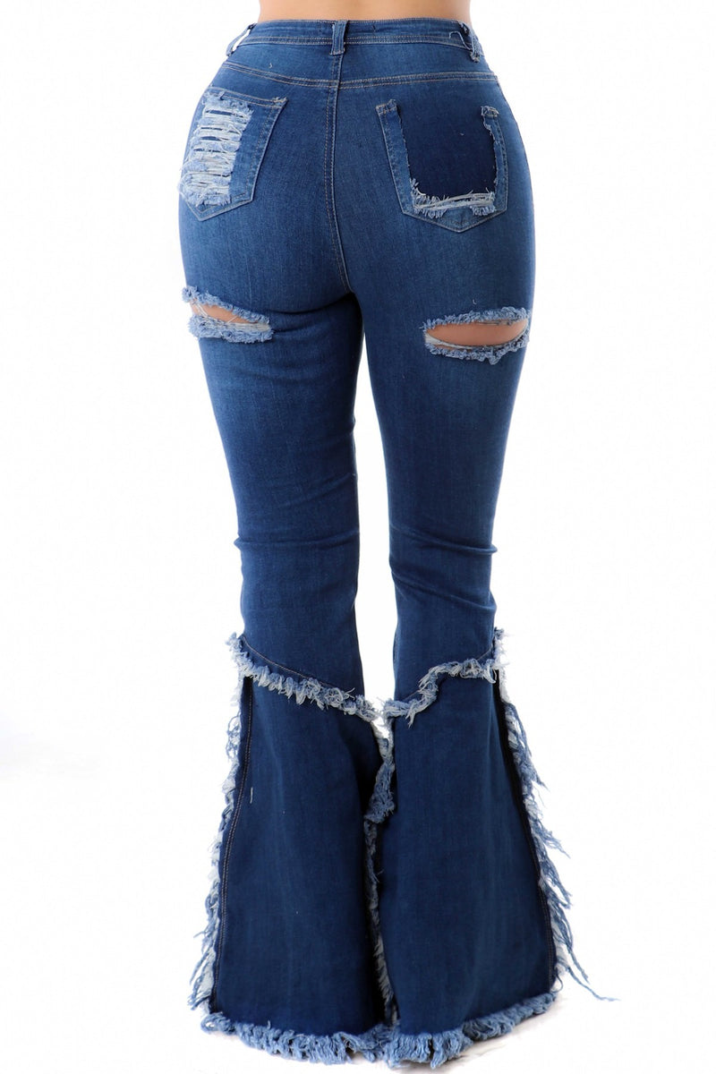 Jeans desgastados de pierna ancha y cintura alta